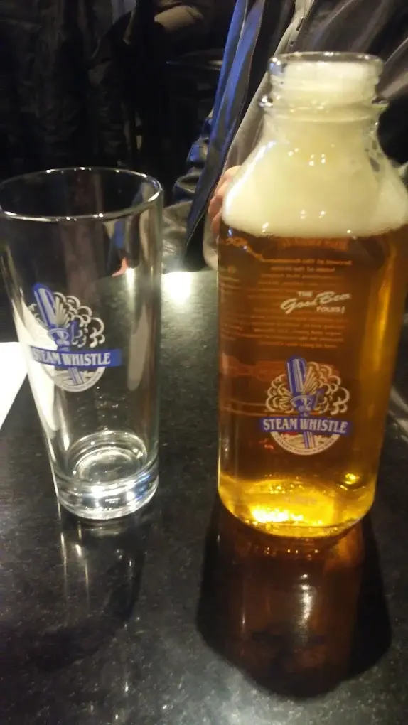 Ice cold draft beer served in the licensed lounge at DJ's Pizzeria & Lounge, St. Albert, AB